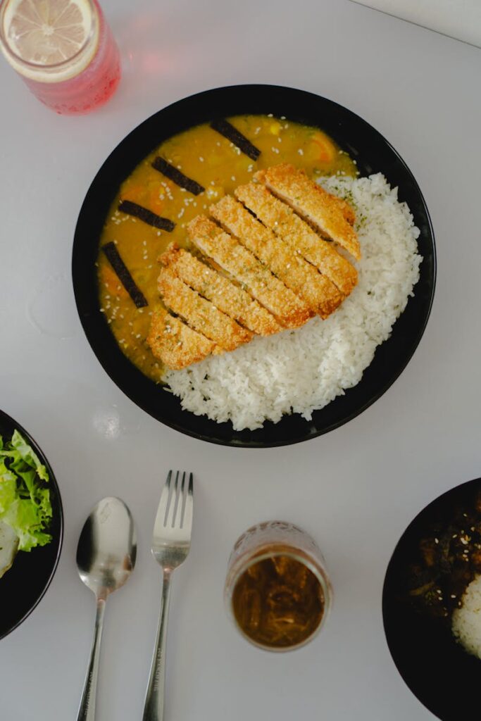 Top view of a Japanese katsu curry dish served with rice