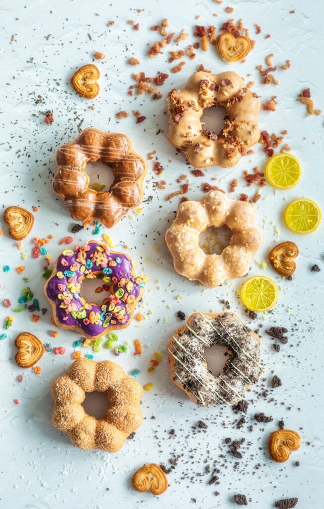 a variety of mochi donuts and pastries on a table