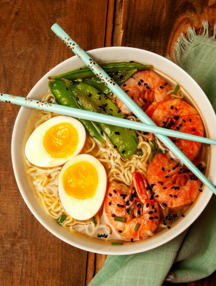 round white bowl with ramen and egg